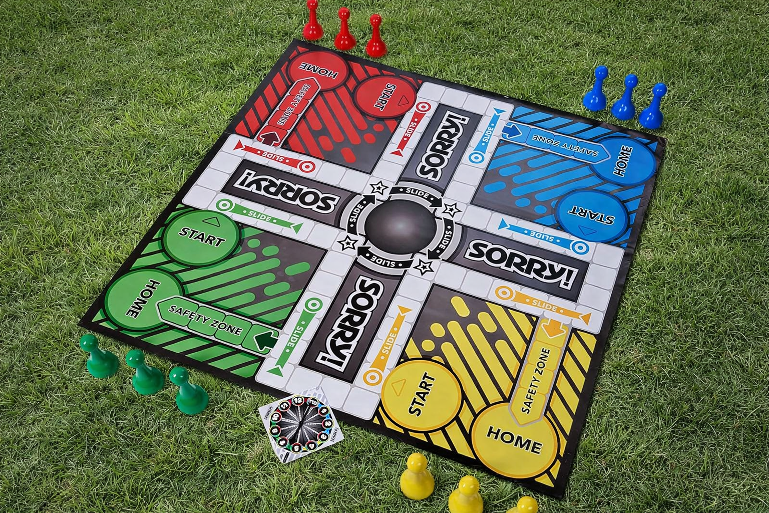 Giant Sorry board game set with oversized pieces for outdoor parties